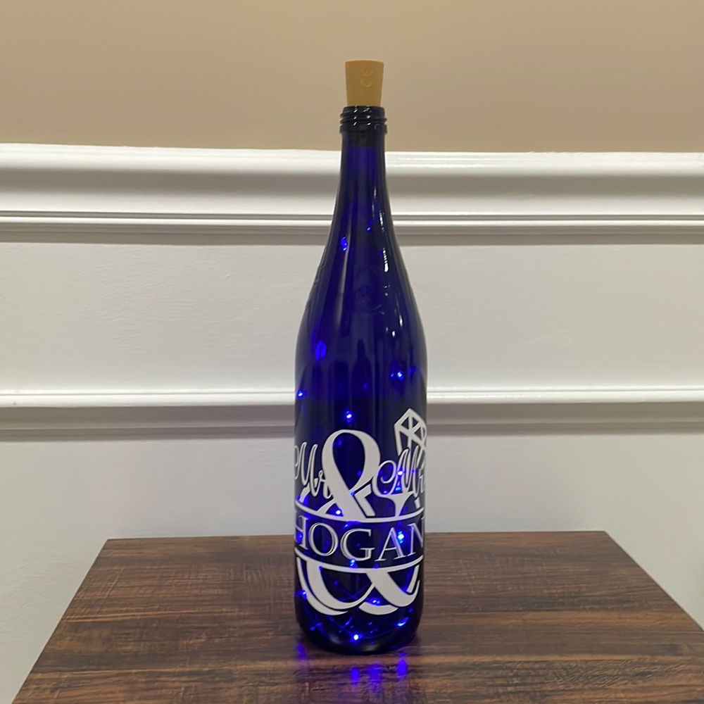 {Mr & Mrs Hogan} Handmade blue light up glass bottle